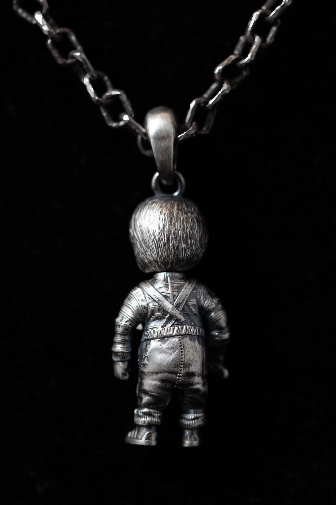 Chucky doll pendant with detachable heads